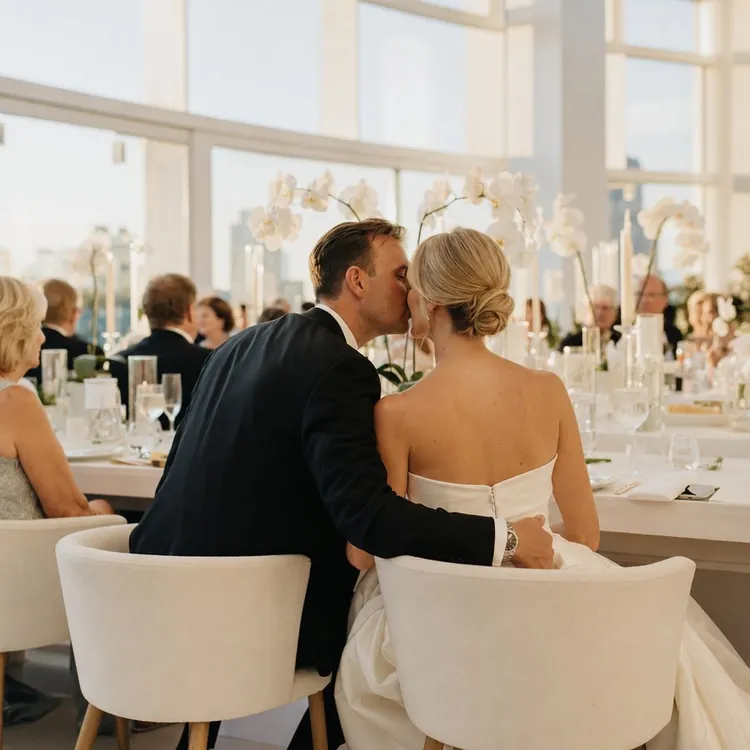 Modern minimalist reception with white orchids
